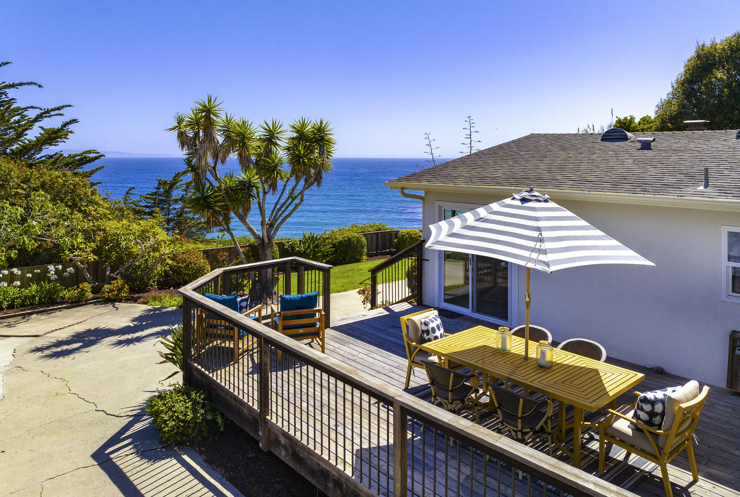 1919 El Camino De La Luz Santa Barbara, CA 93109 - Photo 6 of 28 a view of a balcony with two chairs and a potted plant