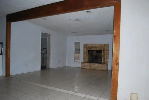 a view of a livingroom with a fireplace