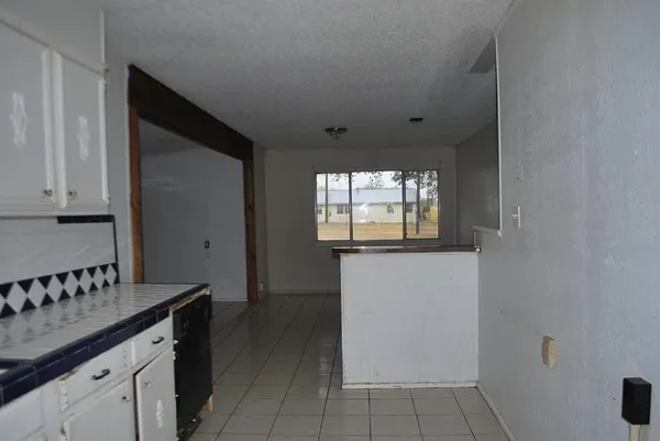 wooden floor and window in a room