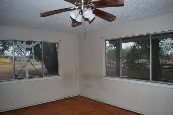 a view of a hallway with closet