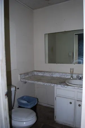 a view of wooden floor and cabinet