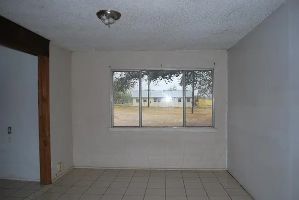 an empty room with a window