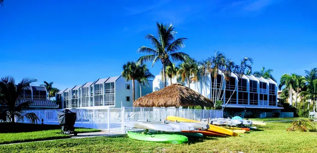 a swimming pool with outdoor seating and yard