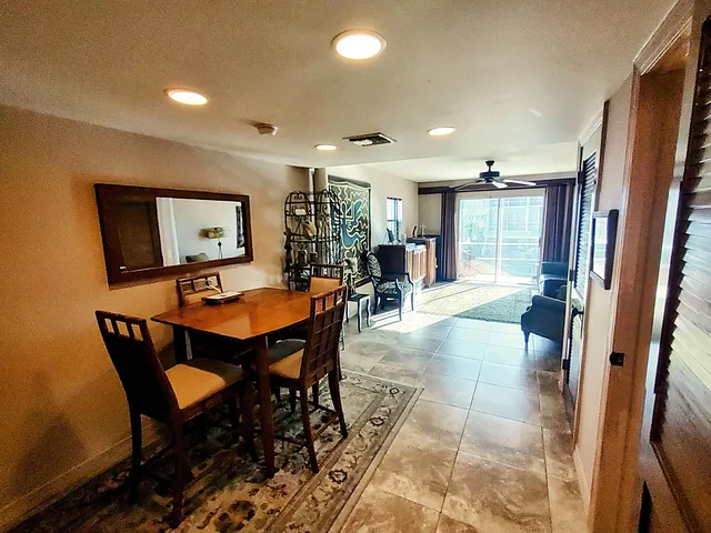 a view of a dining room with furniture
