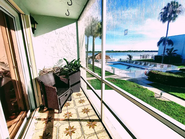 a view of balcony with a potted plant