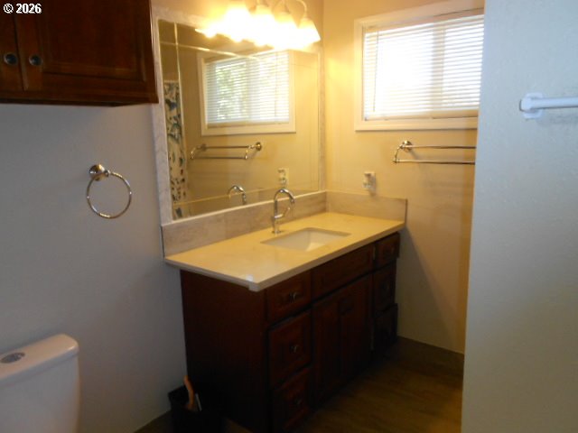17165 Southwest Merlo Road Beaverton, OR 97003 - Photo 13 of 19 a bathroom with a sink and a mirror
