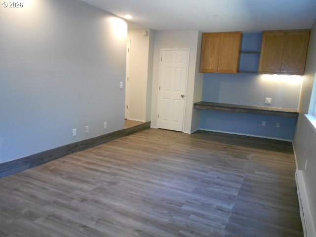 17165 Southwest Merlo Road Beaverton, OR 97003 - Photo 14 of 19 a view of room with wooden floor