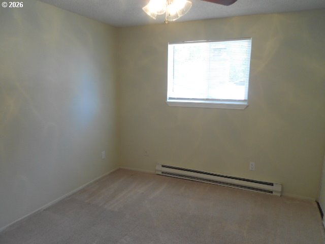 17165 Southwest Merlo Road Beaverton, OR 97003 - Photo 17 of 19 an empty room with a window