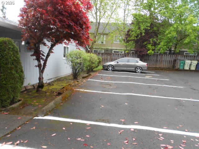 17165 Southwest Merlo Road Beaverton, OR 97003 - Photo 7 of 19 a view of street with parked cars