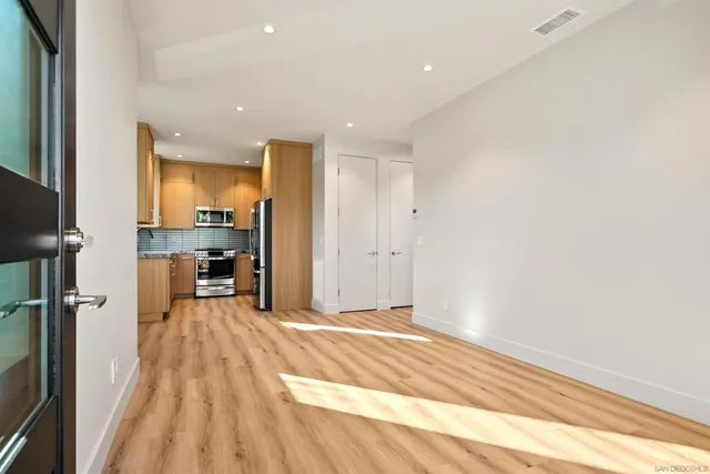 a view of a kitchen with a sink