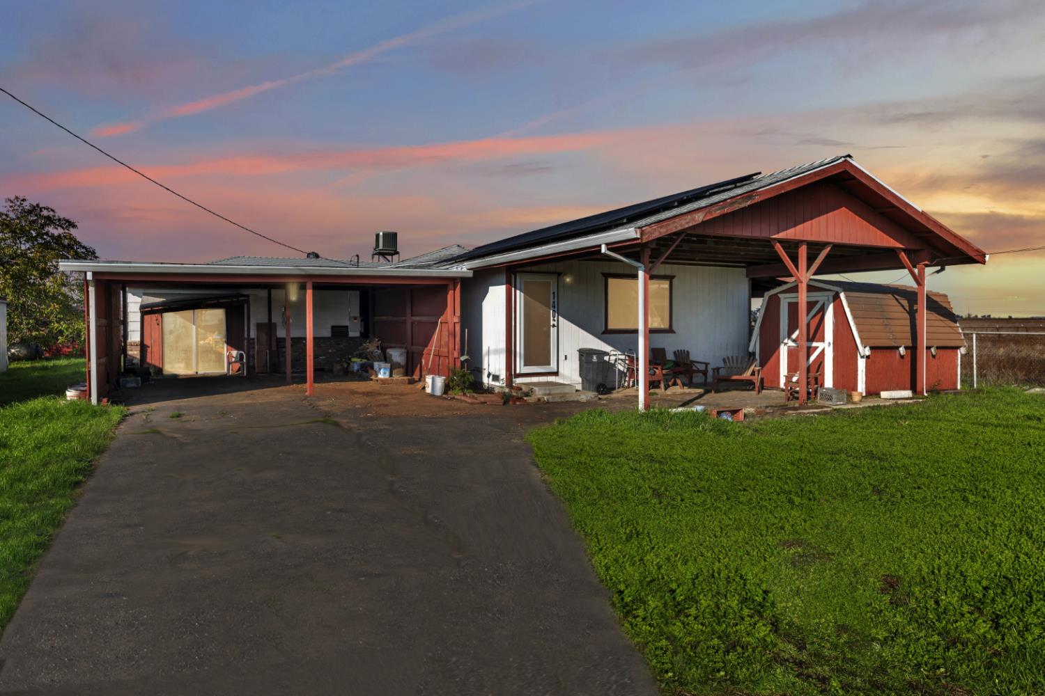 a view of a house with yard and entertaining space