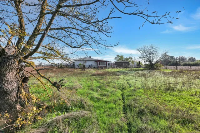 a view of an ocean with a mountain view