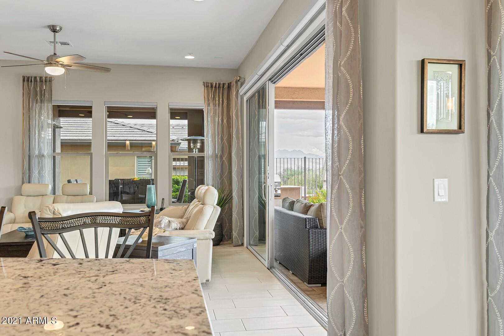17325 East Woolsey Way Rio Verde, AZ 85263 - Photo 11 of 72 Great room living with multiple sliders