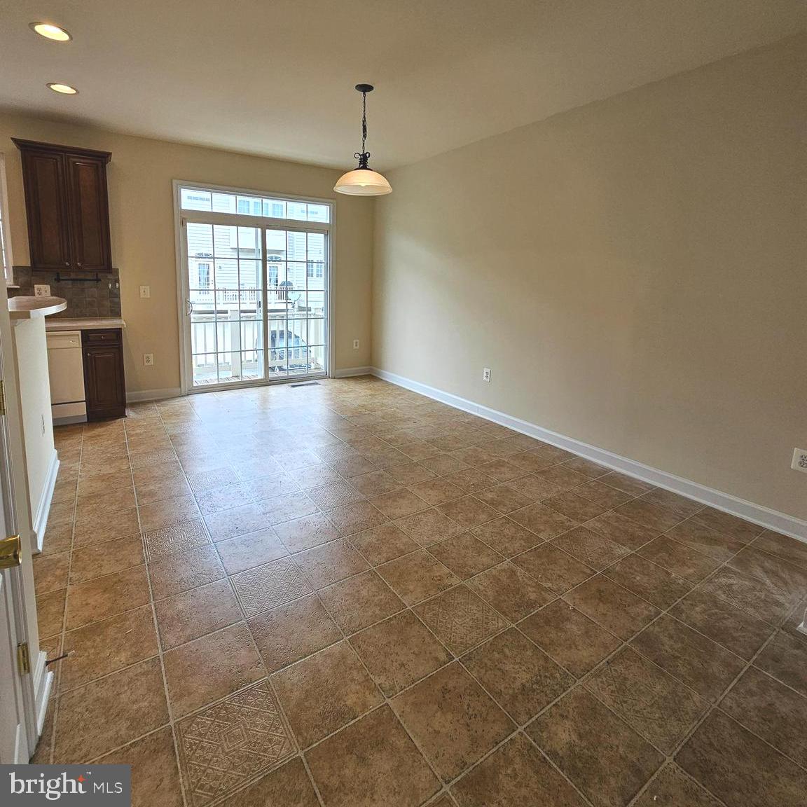 725 Chevington Court Woodbridge, VA 22191 - Photo 15 of 36 a view of an empty room with a fireplace and a window
