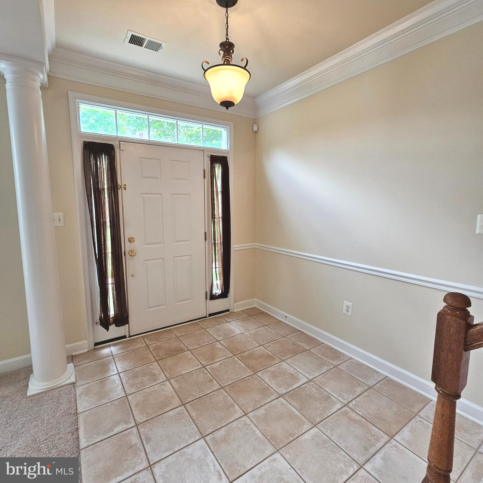 725 Chevington Court Woodbridge, VA 22191 - Photo 2 of 36 a view of a room with wooden floor fan and windows
