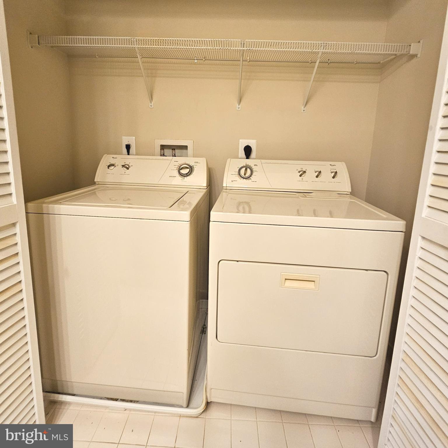 725 Chevington Court Woodbridge, VA 22191 - Photo 31 of 36 a utility room with dryer and washer