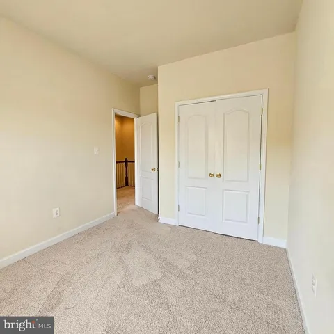 a front view of a house with a garage