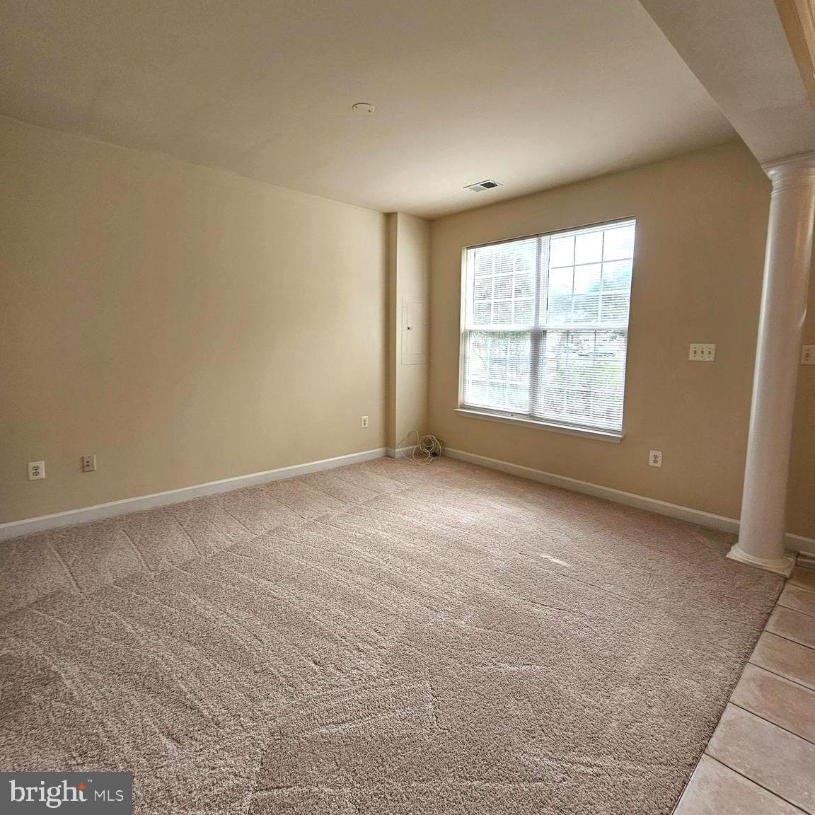 725 Chevington Court Woodbridge, VA 22191 - Photo 5 of 36 a view of an empty room with a window