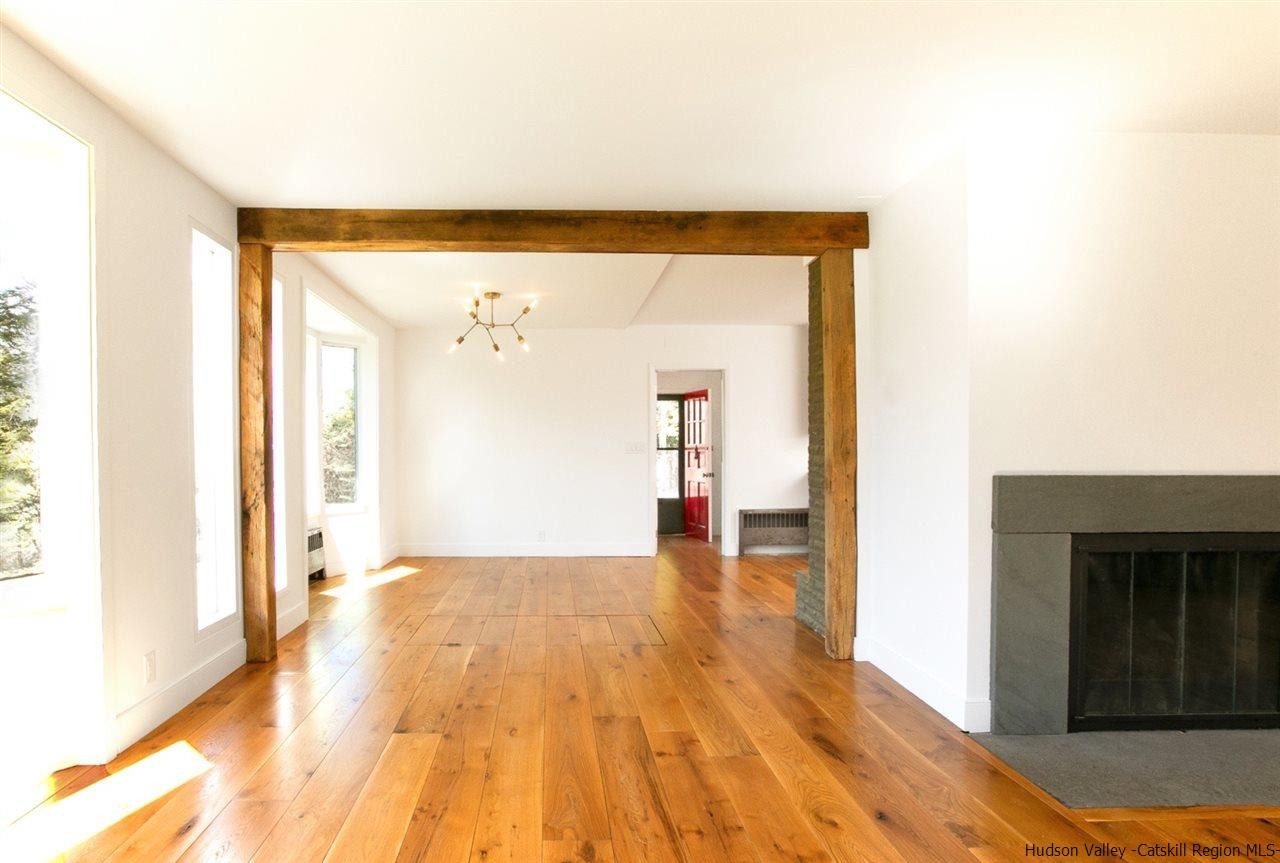 4701 Atwood Road, Unit ROUTE 213 Stone Ridge, NY 12484 - Photo 7 of 35 a view of a room with wooden floor and a window