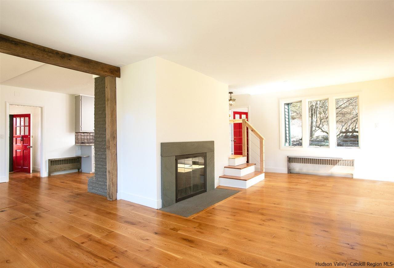 4701 Atwood Road, Unit ROUTE 213 Stone Ridge, NY 12484 - Photo 8 of 35 a view of a livingroom with a fireplace
