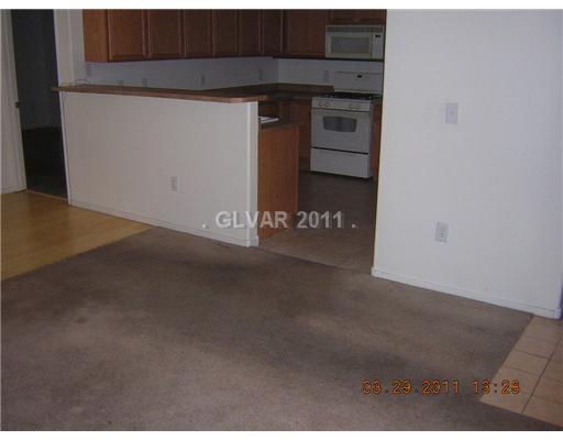 9580 West Reno Avenue, Unit 167 Las Vegas, NV 89148 - Photo 14 of 24 Living Room.