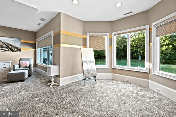 a bed room with furniture and a chandelier