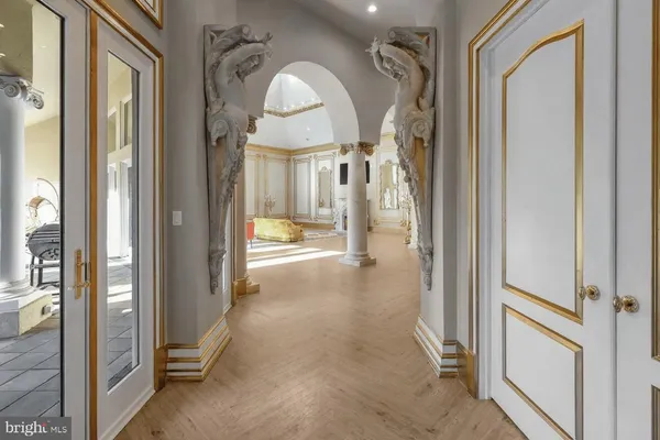 a view of a bathroom with a tub and door