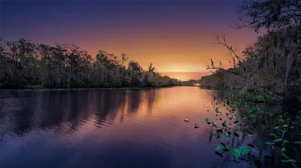 a view of swimming pool with outdoor seating