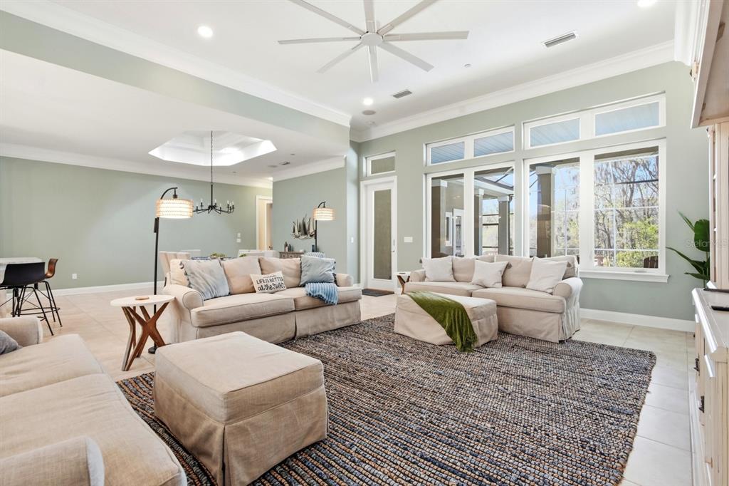 6595 Collier Road St. Augustine, FL 32092 - Photo 17 of 98 a living room with furniture and a large window