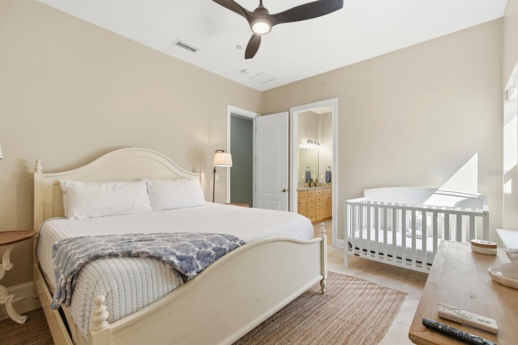 6595 Collier Road St. Augustine, FL 32092 - Photo 31 of 98 a bedroom with a bed and a window