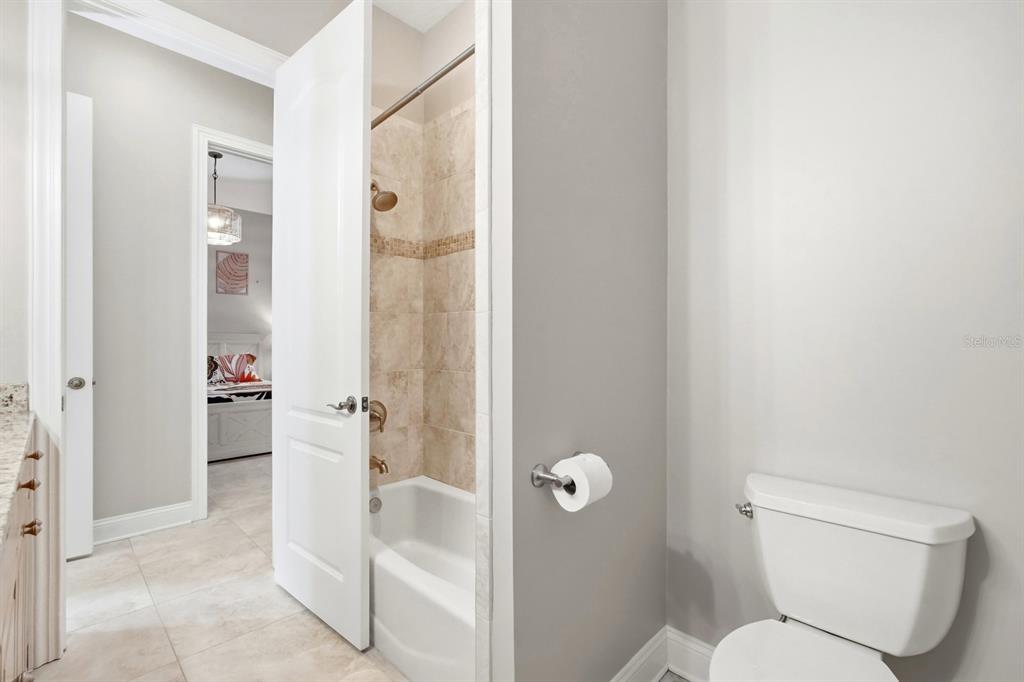 6595 Collier Road St. Augustine, FL 32092 - Photo 41 of 98 a bathroom with a toilet and a shower