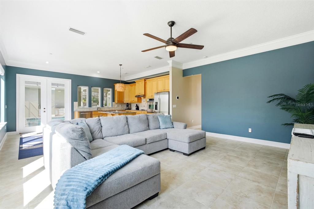 6595 Collier Road St. Augustine, FL 32092 - Photo 46 of 98 a living room with furniture and a large window