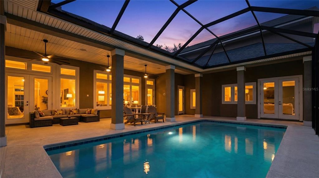 6595 Collier Road St. Augustine, FL 32092 - Photo 8 of 98 a view of swimming pool with outdoor seating