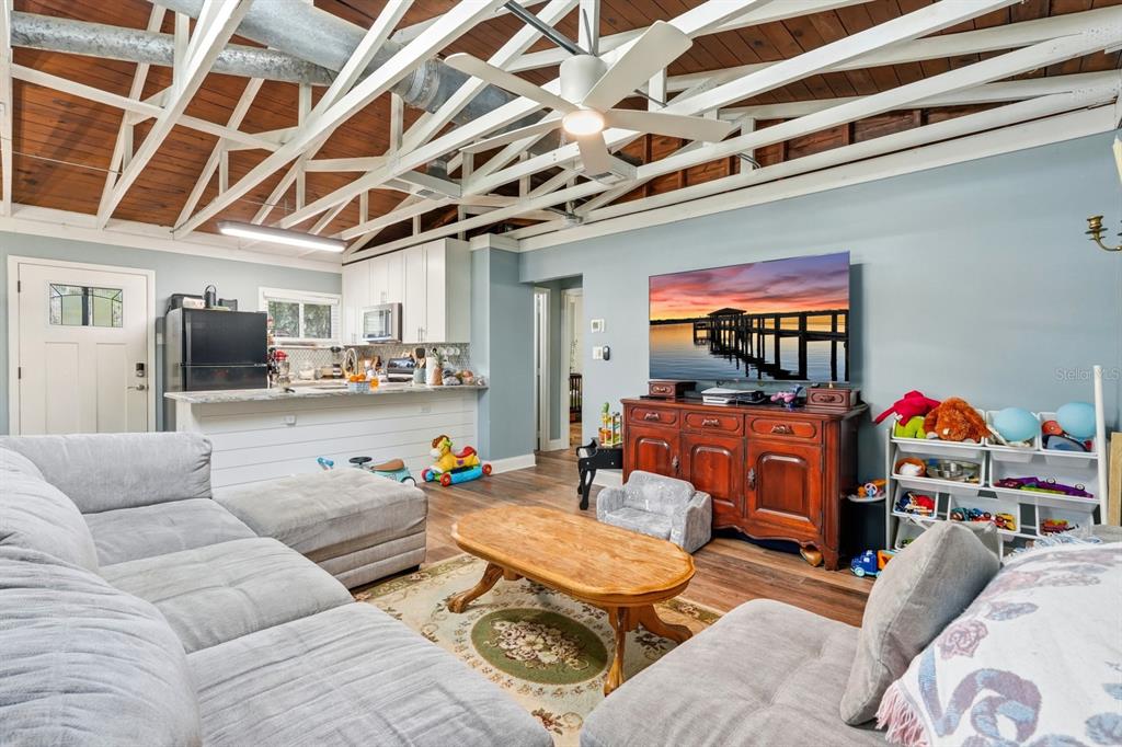 6595 Collier Road St. Augustine, FL 32092 - Photo 93 of 98 a outdoor living space with furniture and a flat screen tv