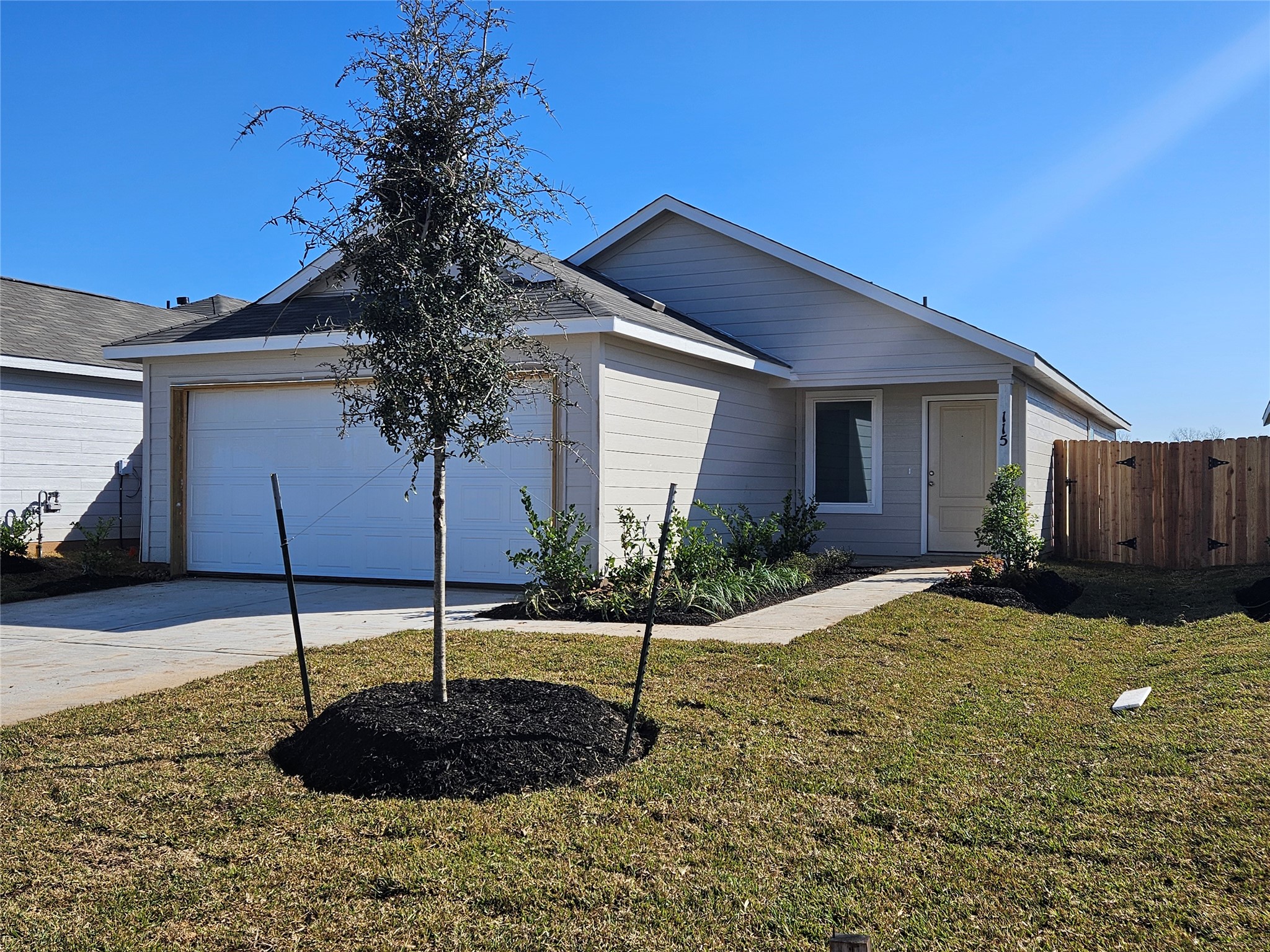 658 Maria Elena Way Cleveland, TX 77327 - Photo 1 of 24 a house view with a garden space