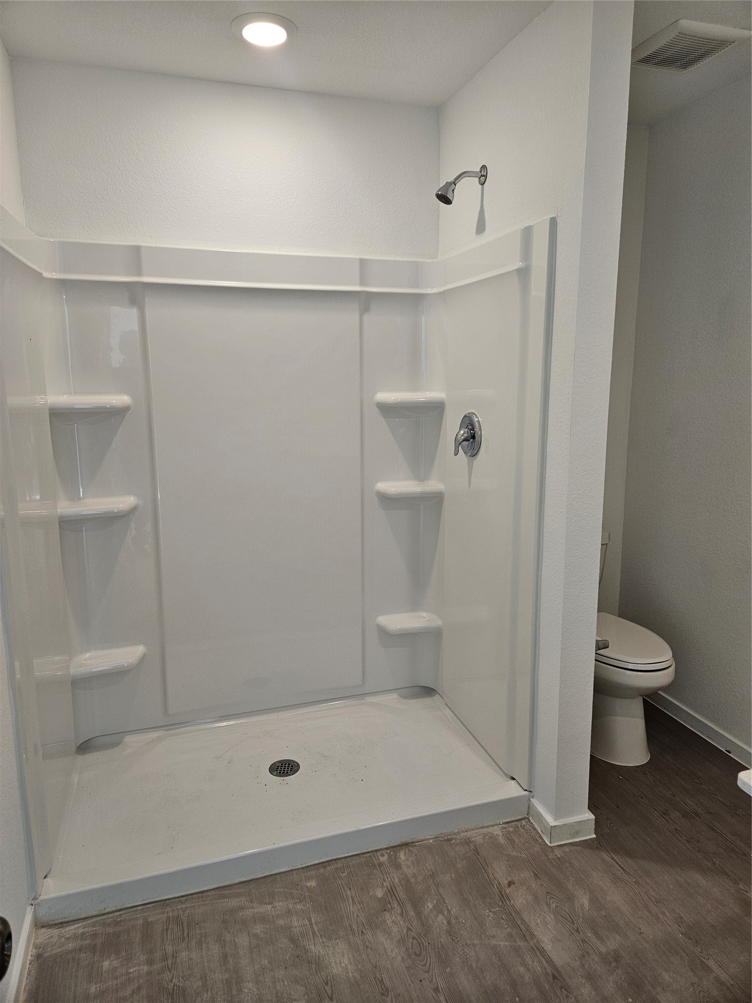 658 Maria Elena Way Cleveland, TX 77327 - Photo 9 of 24 a bathroom with a shower