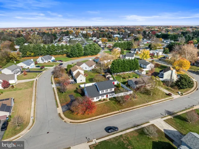 an aerial view of a house with a ocean view