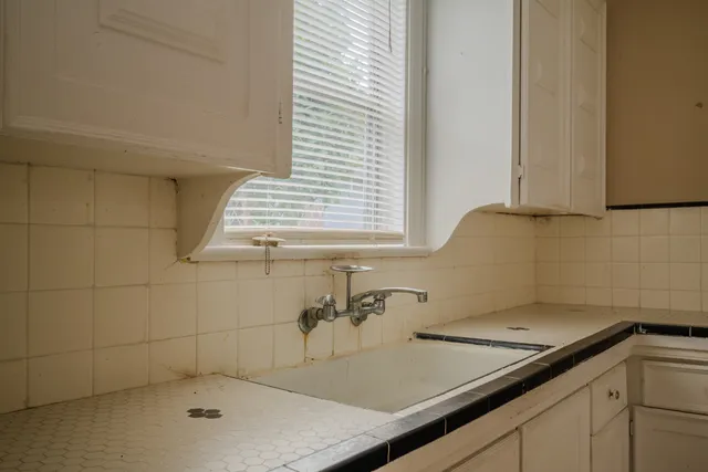a bathroom with a sink and a bathtub