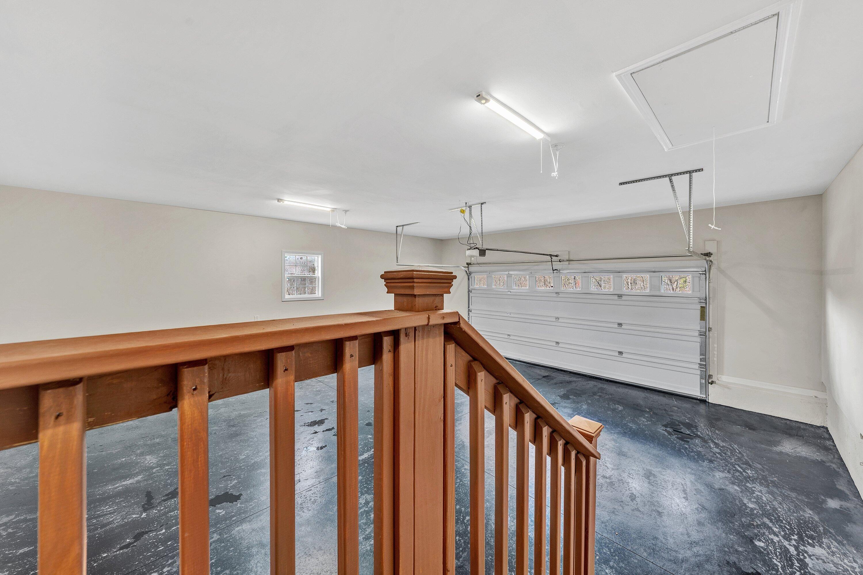 6507 Goodview Road Goodview, VA 24095 - Photo 20 of 28 a view of staircase with lots of wooden floor and white walls