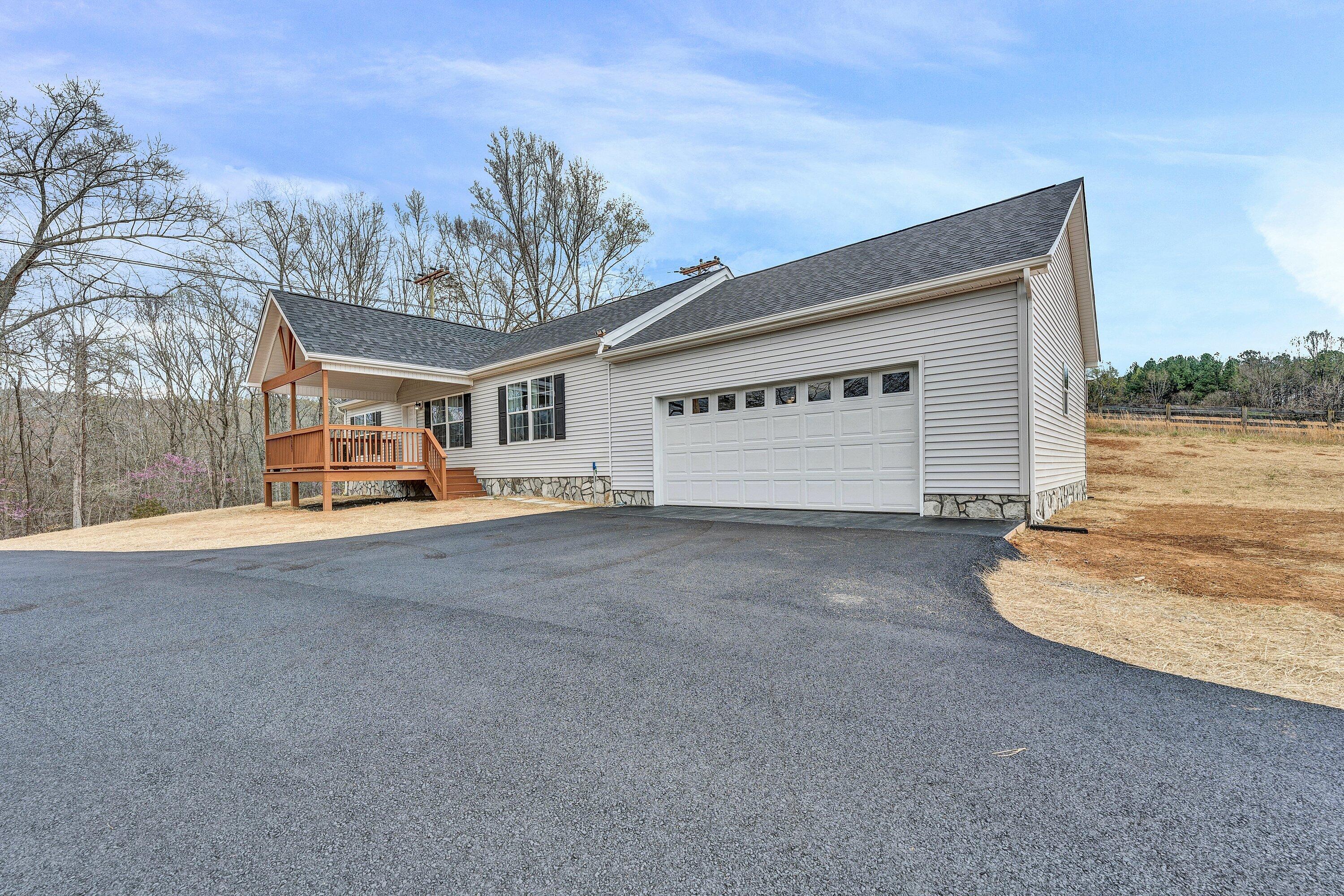 6507 Goodview Road Goodview, VA 24095 - Photo 2 of 28 a view of a street with a house