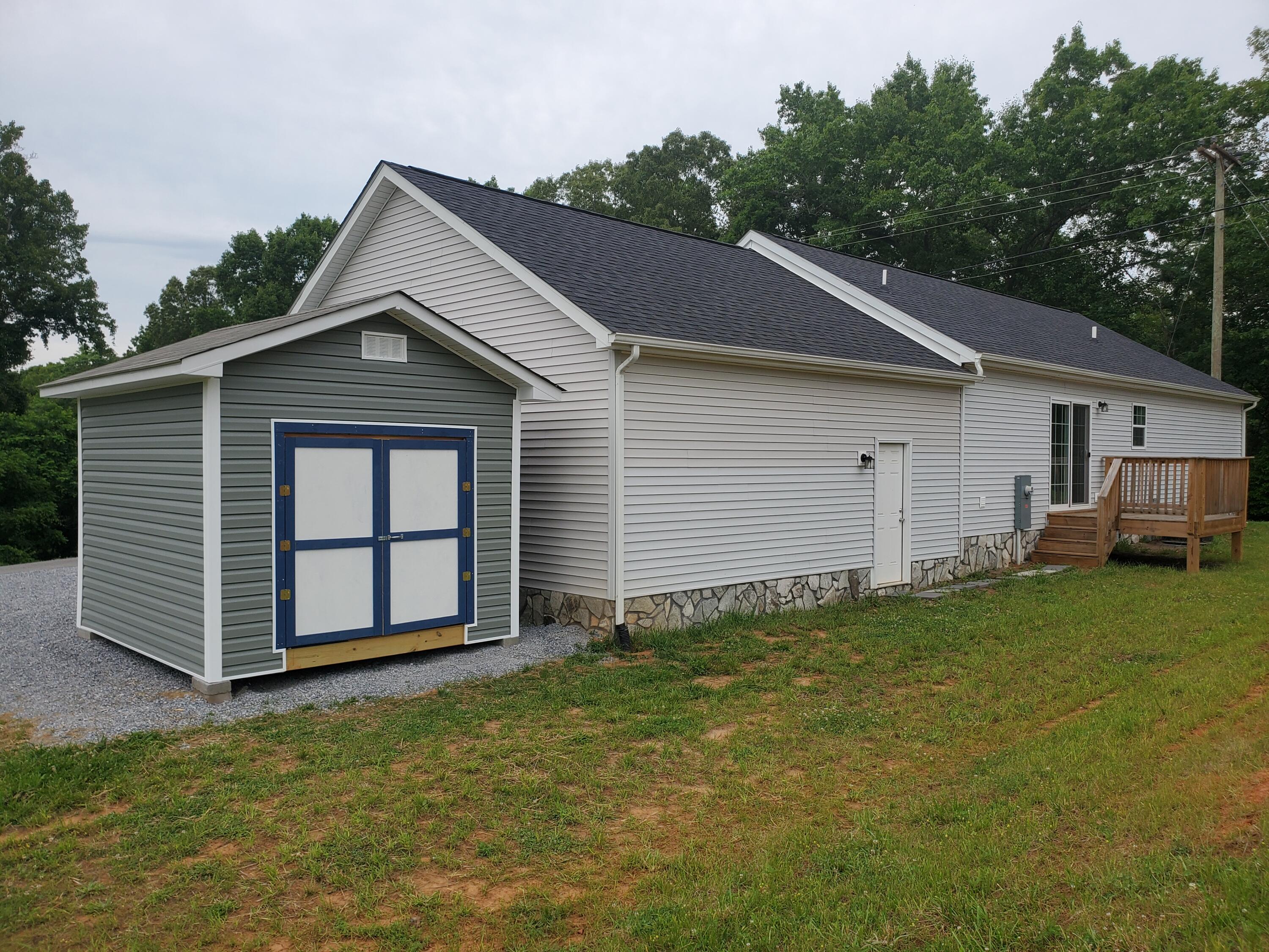 6507 Goodview Road Goodview, VA 24095 - Photo 26 of 28 a view of a house with a yard