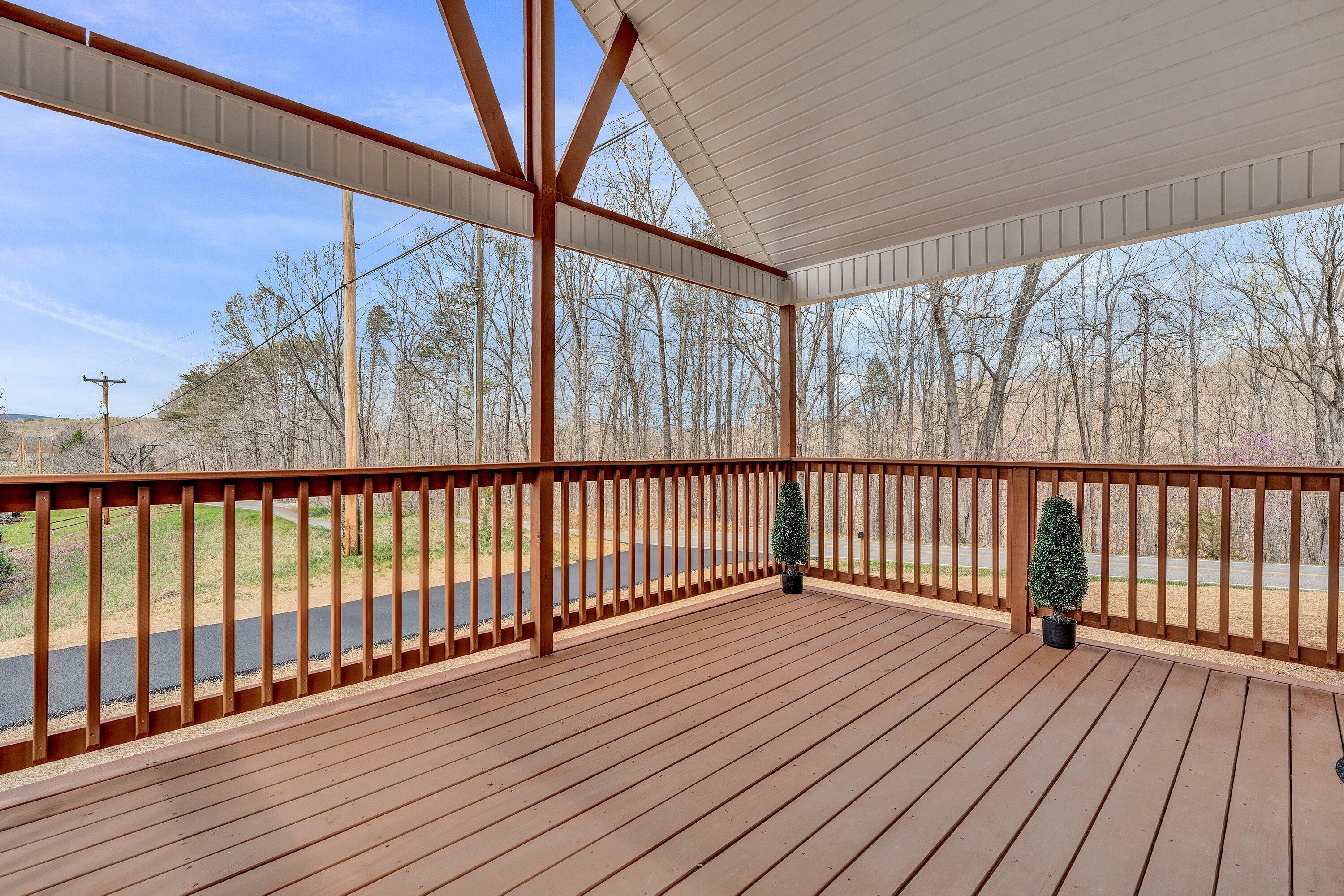6507 Goodview Road Goodview, VA 24095 - Photo 5 of 28 a view of balcony with wooden floor