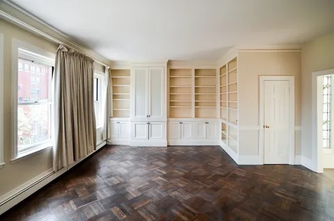 a view of empty room with windows