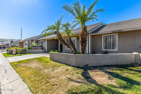 a view of house with swimming pool