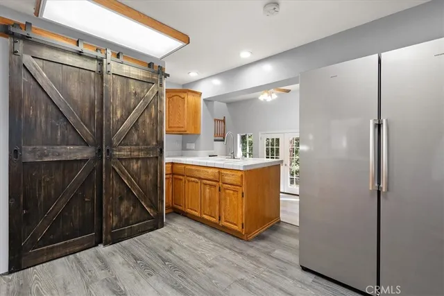 a bathroom with a sink a mirror and shower