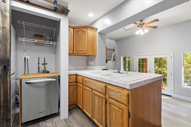 a kitchen with a stove a sink and dishwasher