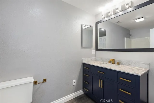 a bathroom with a sink and a toilet