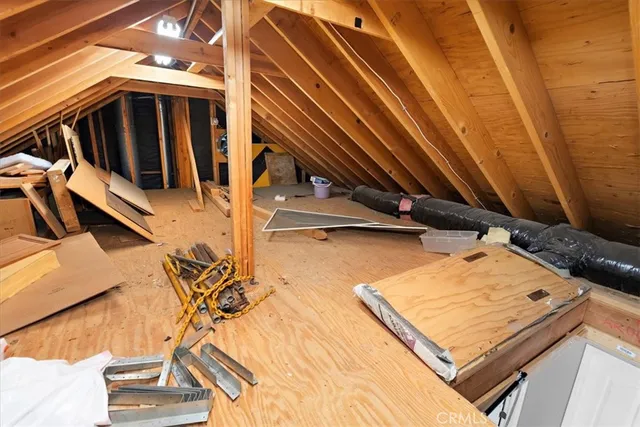 a bathroom with a sink a toilet and a shower