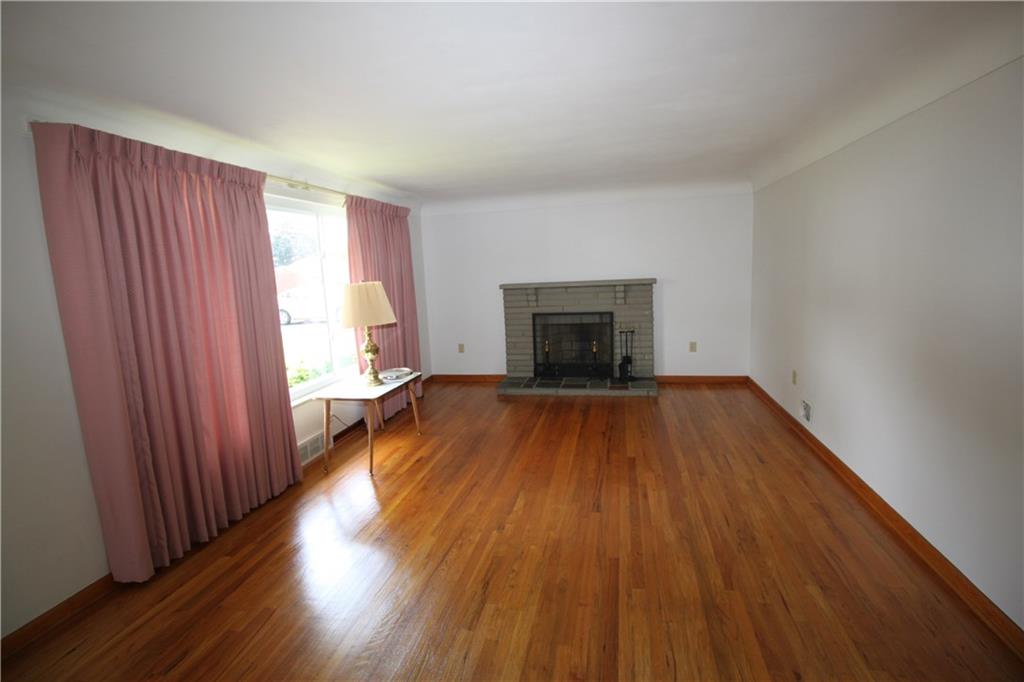 1165 Princeton Road Monroeville, PA 15146 - Photo 11 of 21 Fireplace in living room with Pan ceiling