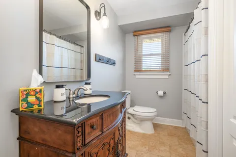 a bathroom with a sink and a toilet